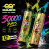 **Creating alt text for graphic** I need to generate concise alt text that's about a sentence long and avoid too much interpretation. The graphic is a promotional piece for the EQQ Bang 30k, which offers 30,000 puffs and comes in 12 different flavors. It shows two disposable vapes with pineapple and tropical fruit designs, and the specs state it has type-C charging, a 650mAh battery, and dual mesh at 1.2 ohms. Let’s craft that alt text! Promotional graphic for EQ BANG “30000 Puffs” disposable vape, showing two colorful tropical-flavor devices with cartoon fruit characters and bright paint-splatter background, plus text highlighting 12 flavors, Type-C charging, 650mAh battery, and dual mesh 1.2 ohm