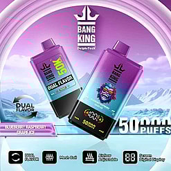 Marketing Image Of Bang King Disposable Vape Devices Featuring Dual Flavors, Mesh Coil Technology, Adjustable Airflow, And Digital Display, Highlighted With A Vibrant Purple And Teal Icy Backdrop; The Prominent Flavors Shown Are Blueberry Raspberry Grape Ice.