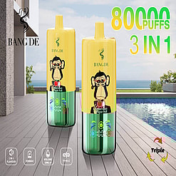Two Bang De Vape Devices Featuring A Yellow Monkey Graphic And Text Details About 80,000 Puffs, 3-In-1 Flavours, And Rechargeable Via Type-C, Displayed On A Wooden Deck Near A Pool And Sea View.