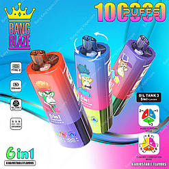 Promotional image featuring three colorful Bang Blaze 100k 6in1 vape devices with cartoon monkey graphics, highlighting features like 6-in-1 adjustable flavors, 10,000 puffs, 850mAh battery, Type-C charging, and oil tank options on a vibrant blue and pink background.