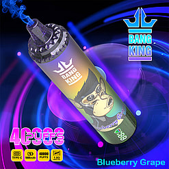 A Promotional Image Showcasing A Bang King Disposable Vaping Device Themed With Blueberry Grape Flavor, Featuring A Playful Monkey Logo, Glowing Blue And Purple Neon Lights In The Background, And Product Specifications Detailing A 40,000-Puff Capacity And Type-C Charging.