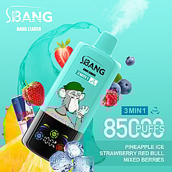 Promotional Image For A Vaping Product Featuring A Mint-Green Vape Device With A Monkey Graphic, Advertising Pineapple Ice, Strawberry Red Bull, And Mixed Berries Flavors. The Product Claims 8,500 Puffs And Features A Tropical-Themed Background With Fruits And Beverage Visuals.