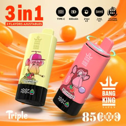 Two Bang King Vapen E-Cigarettes In Yellow And Pink Colors Featuring Cartoon Monkey Designs, Advertising 3-In-1 Flavor Options And 85,000 Puffs.