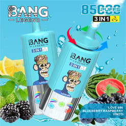 Image promotionnelle de Bang Legend 3-en-1 Disposable Vape Device avec une illustration de singe stylisée et des saveurs comme Blueberry Raspberry Vimto, entourée d'images de fruits et d'un fond bleu.