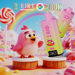 Pink Cartoon Bird Beside Two Bang King Vapen 8-In-1 Vape Devices In A Candyland Scene With Rainbow And Lollipop Backdrop