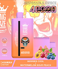 Promotional Image Of A Bang Blaze Disposable Vaping Device In An Orange-To-Purple Gradient With 40Ml Capacity And 650Mah Battery, Adorned With A Skull Graphic And Advertising Flavors Berries Cool And Watermelon Sour Peach.