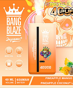 Promotional Image Of The Bang Blaze Joycome Disposable Vaping Device Featuring Its Pineapple Mango And Pineapple Coconut Ice Flavors, With Design Elements Including A Skull Wearing A Crown On The Device And Colorful Tropical Fruit Accents.