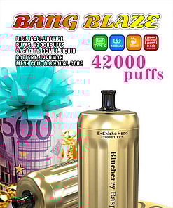 Promotional Image Of The Bang Blaze Disposable E-Shisha Head In A Gold Design With Blueberry Raspberry Flavor, Depicted Alongside Colorful Currency And A Gift Box With A Bow, Highlighting Features Such As 42,000 Puffs, 1000Mah Battery, And 30Ml Liquid Capacity.