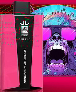 A Close-Up View Of A Bang King 30K Pro Vaping Device In Pink With A Strawberry Watermelon Flavor, Set Against A Vibrant Backdrop Featuring A Colorful Artistic Gorilla Design With Sunglasses.