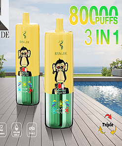 Two Yellow And Green Vape Pens With A Cartoon Monkey Design On A Poolside Setting, Featuring Promotional Text For '80000 Puffs' And '3 In 1' Flavors.