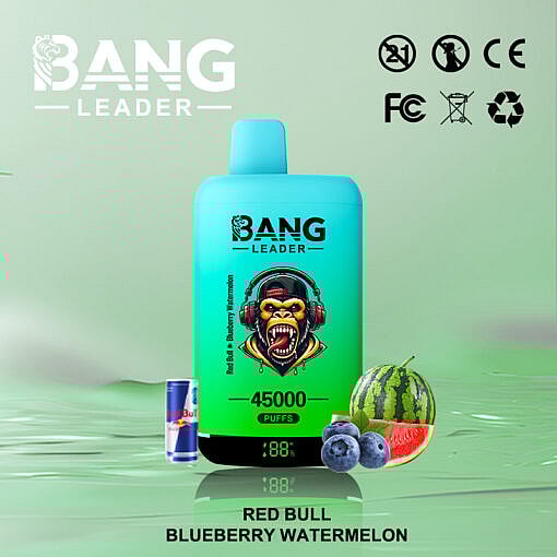 A Promotional Image For Bang Leader Vape Featuring The Product With 45,000 Puffs In Turquoise Packaging, Accompanied By A Red Bull Can, Blueberries, And A Watermelon Slice On A Green Background.